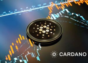 Cardano kovanica s financijskim grafom u pozadini, prikazuje kripto tržišne trendove.