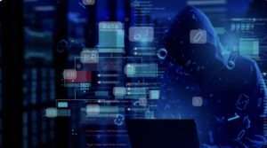 Tajanstveni haker u plavom ambijentu manipulira podacima i istražuje digitalni svijet.