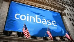 Coinbase banner at New York Stock Exchange symbolizes modern finance in historic setting.