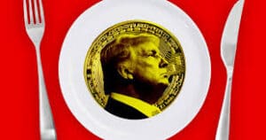 Zlatnik na bijelom tanjuru s crvenom pozadinom, vilicom i nožem, simbol bogatstva.